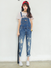 contemporary ripped denim overalls