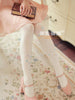 rhinestone studded winter tights in milk white