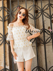 golden star sheer top and romper set