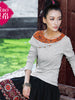 sloping embroidered shoulder top