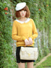 ginger yellow sweater with lace collar