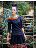sloping embroidered shoulder top
