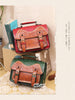 vintage college stitched satchel