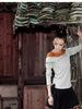 sloping embroidered shoulder top