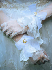 pearl lace bow cuffs